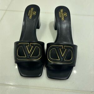 Valentino Garavani Black Mules with Gold Accents